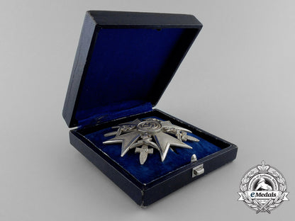 a_fine_quality_spanish_cross_with_swords_in_silver_by_c._e._juncker_in_its_original_case_of_issue_d_7598_1
