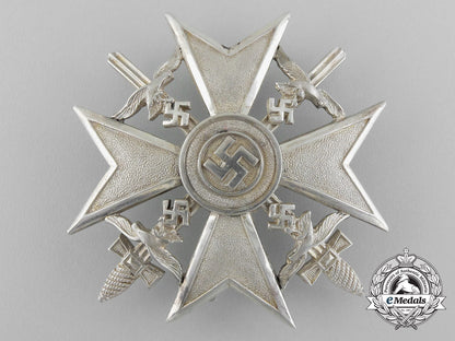 a_fine_quality_spanish_cross_with_swords_in_silver_by_c._e._juncker_in_its_original_case_of_issue_d_7600_1