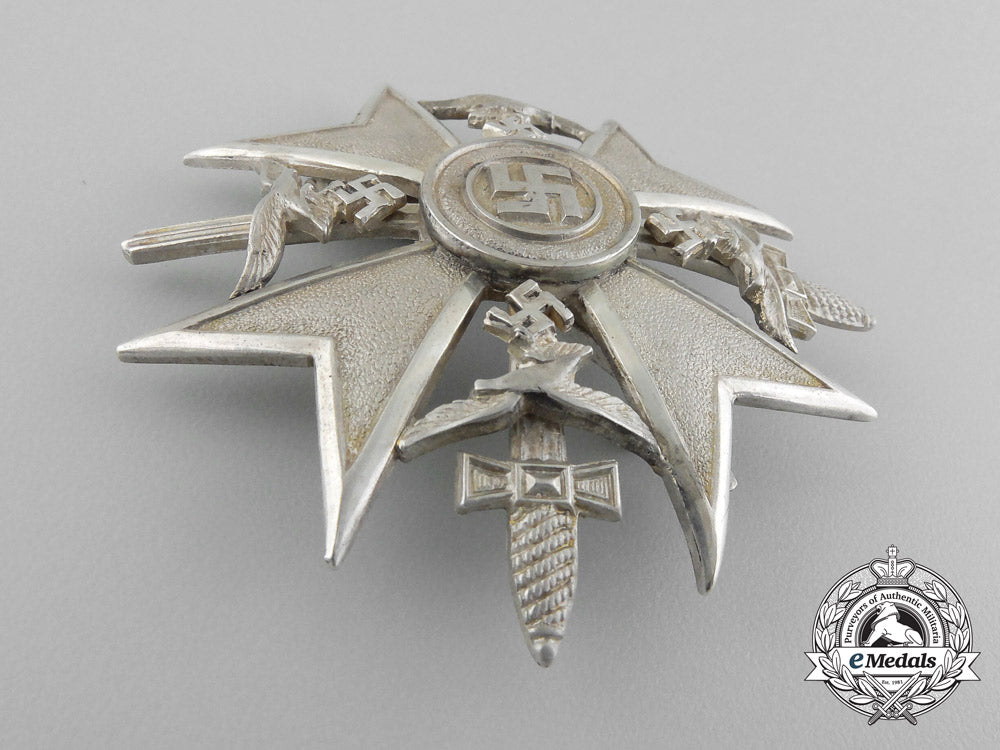 a_fine_quality_spanish_cross_with_swords_in_silver_by_c._e._juncker_in_its_original_case_of_issue_d_7602_1