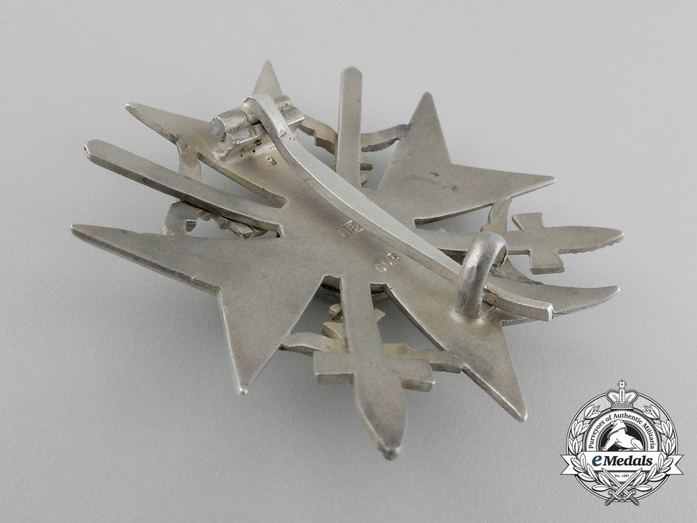 a_fine_quality_spanish_cross_with_swords_in_silver_by_c._e._juncker_in_its_original_case_of_issue_d_7603_1
