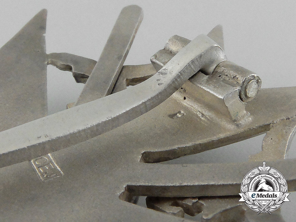 a_fine_quality_spanish_cross_with_swords_in_silver_by_c._e._juncker_in_its_original_case_of_issue_d_7605_1