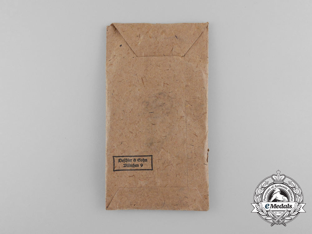 an_absolutely_mint_war_merit_cross_without_swords_in_its_original_packet_of_issue_by_deschler&_sohn_d_7620_1