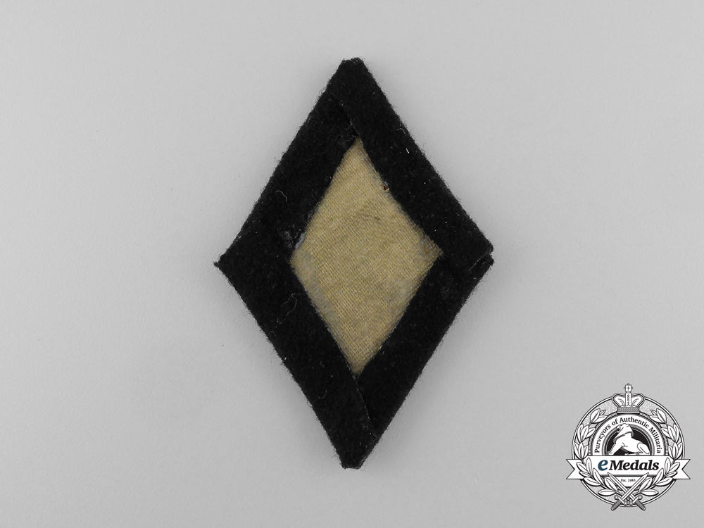 germany._a_waffen-_ss_quartermaster_sergeant_sleeve_diamond,_removed_from_salesman’s_board_d_7653_1