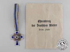 A Bronze Grade Mother’s Cross With Original Packet Of Issue By Wilhelm Schröder & Co.