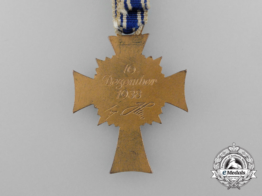 a_bronze_grade_mother’s_cross_with_original_packet_of_issue_by_wilhelm_schröder&_co._d_7842