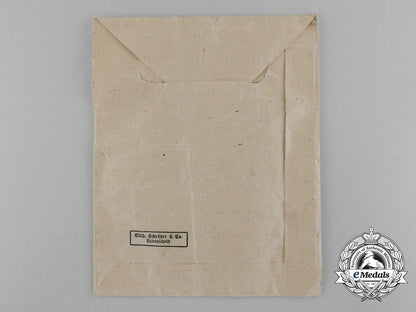 a_bronze_grade_mother’s_cross_with_original_packet_of_issue_by_wilhelm_schröder&_co._d_7843