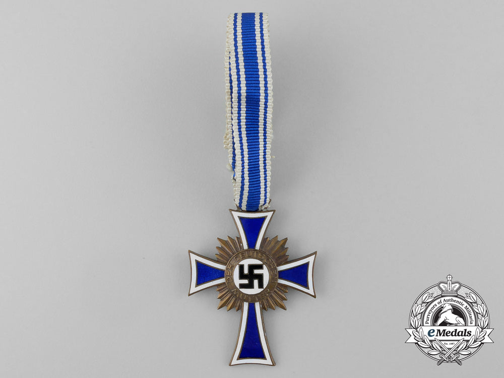 a_bronze_grade_mother’s_cross_in_its_original_packet_of_issue_named_to_anna_alrecht_by_heinrich_vogt_d_7848_1