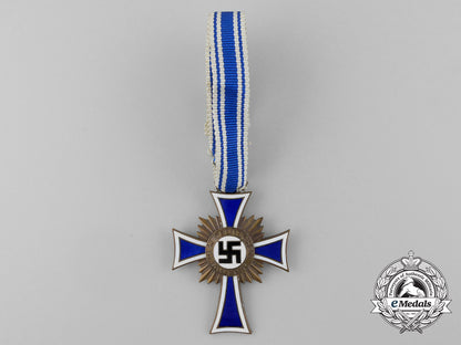 a_bronze_grade_mother’s_cross_in_its_original_packet_of_issue_named_to_anna_alrecht_by_heinrich_vogt_d_7848_1
