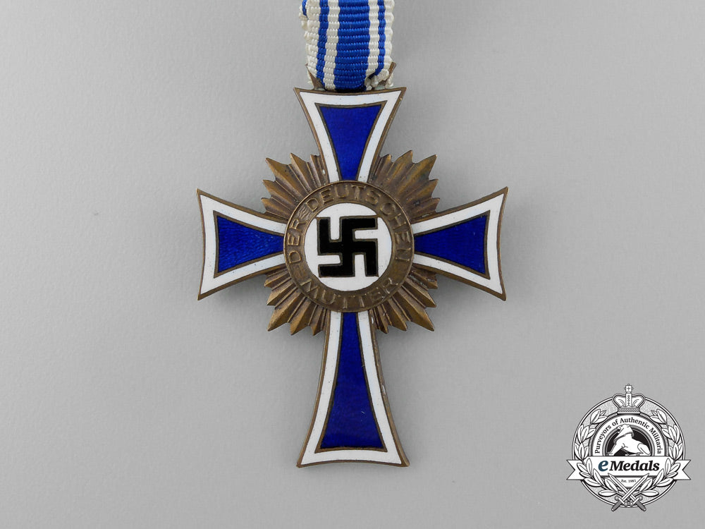 a_bronze_grade_mother’s_cross_in_its_original_packet_of_issue_named_to_anna_alrecht_by_heinrich_vogt_d_7849_1
