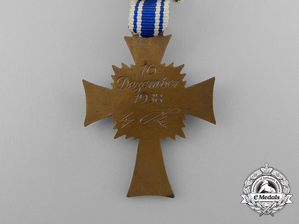 a_bronze_grade_mother’s_cross_in_its_original_packet_of_issue_named_to_anna_alrecht_by_heinrich_vogt_d_7850_1