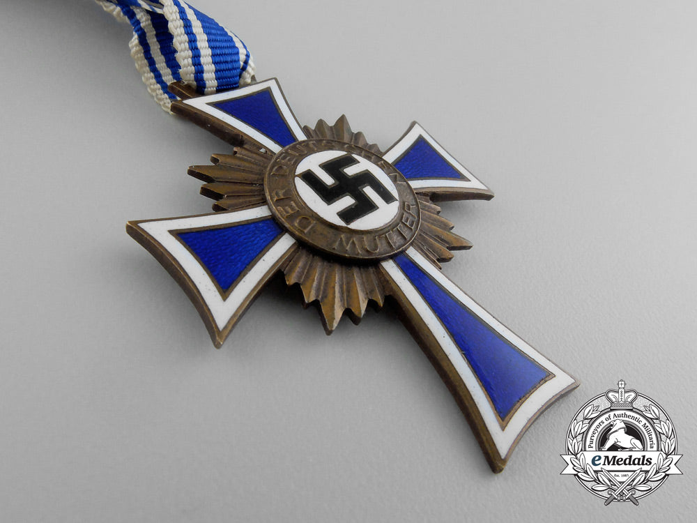 a_bronze_grade_mother’s_cross_in_its_original_packet_of_issue_named_to_anna_alrecht_by_heinrich_vogt_d_7851_1
