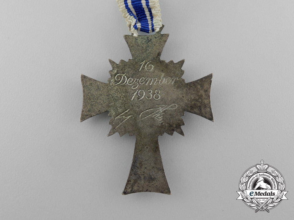 a_silver_grade_mother’s_cross_in_its_original_packet_of_issue_by_fritz_zimmermann_d_7857_1