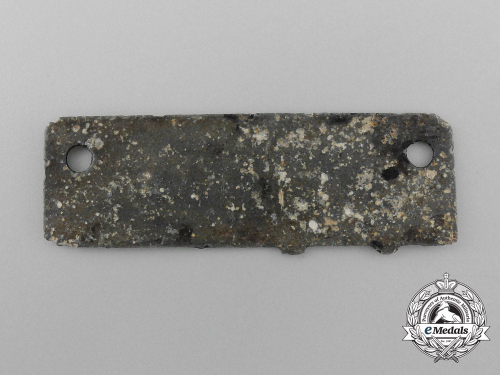 a_german_pow_camp_id_tag_for_allied_soldiers_housed_at_the_stalag_iii-_c_camp_d_7858