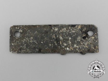 a_german_pow_camp_id_tag_for_allied_soldiers_housed_at_the_stalag_iii-_c_camp_d_7858