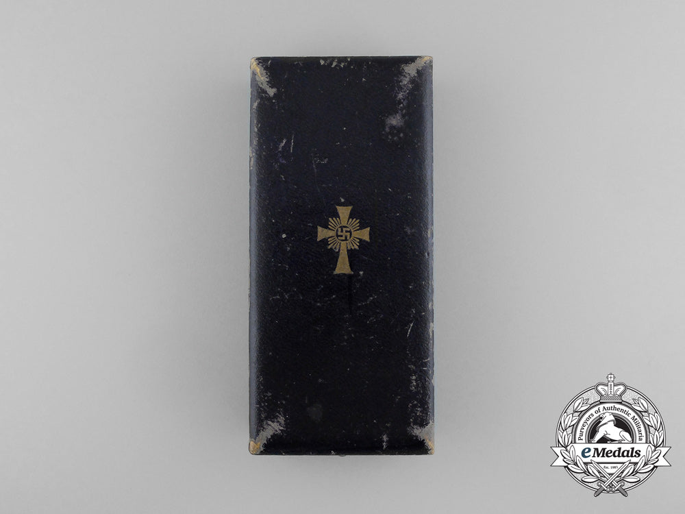 a_golden_grade_german_mother’s_cross_with_its_original_case_of_issue_by_werner_redd_d_7869_1