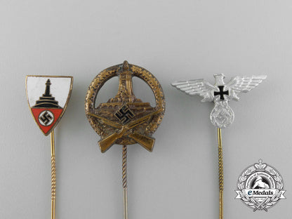 a_grouping_of_three_third_reich_period_veteran’s_organization_stick_pins_d_7884_1