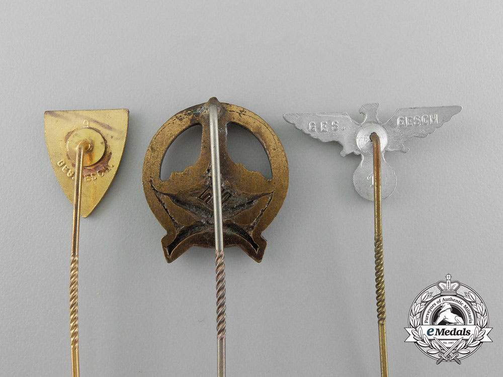 a_grouping_of_three_third_reich_period_veteran’s_organization_stick_pins_d_7885_1