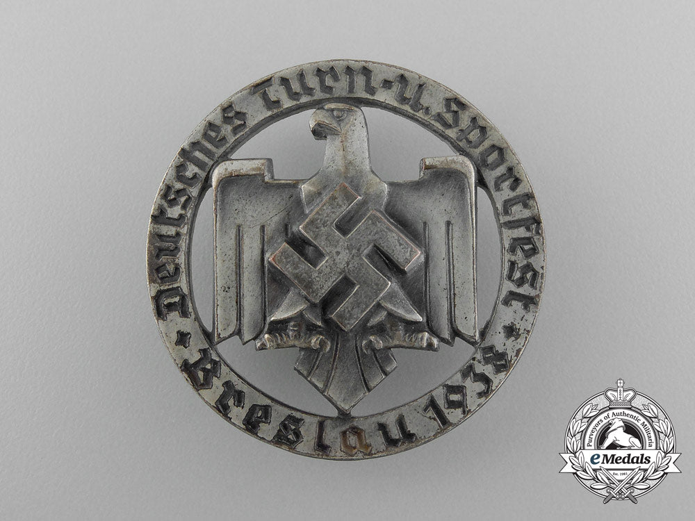 a_fine_quality1938_breslau_german_gymnastics_and_sports_celebration_badge_by_robert_neff_of_berlin_d_7937_1