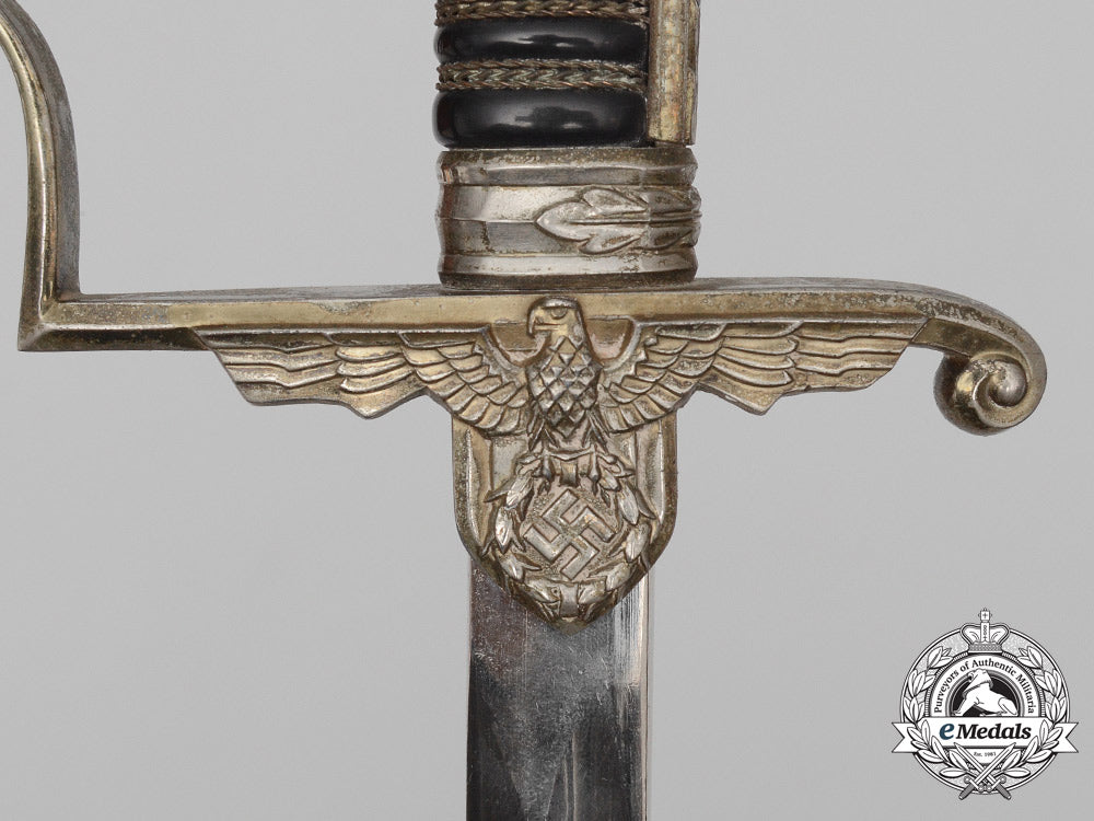 a_german_second_war_army_officer’s_sabre_by_carl_eickhorn_d_8051_1