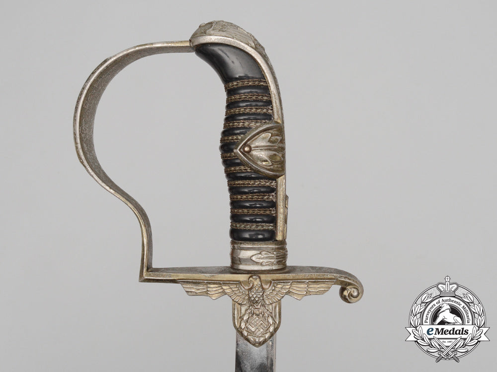 a_german_second_war_army_officer’s_sabre_by_carl_eickhorn_d_8052_1