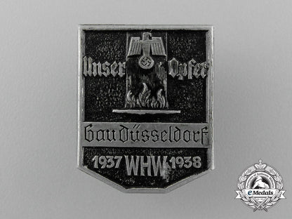 a1937/38_whw(_winter_relief_of_the_german_people)_gau_düsseldorf_donation_badge_d_8313_1