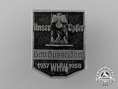 a1937/38_whw(_winter_relief_of_the_german_people)_gau_düsseldorf_donation_badge_d_8313_1