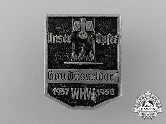 a1937/38_whw(_winter_relief_of_the_german_people)_gau_düsseldorf_donation_badge_d_8313_1