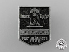 A 1937/38 Whw (Winter Relief Of The German People) Gau Düsseldorf Donation Badge