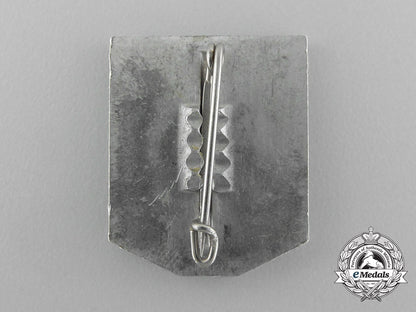 a1937/38_whw(_winter_relief_of_the_german_people)_gau_düsseldorf_donation_badge_d_8314_1