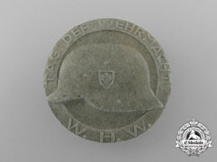 A Third Reich Period “Day Of The Wehrmacht For The Winter Relief Of The German People Badge