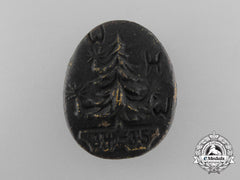 A Unique 1934-1935 Winterhilfswerk Badge