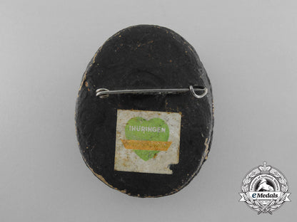 a_unique1934-1935_winterhilfswerk_badge_d_8447