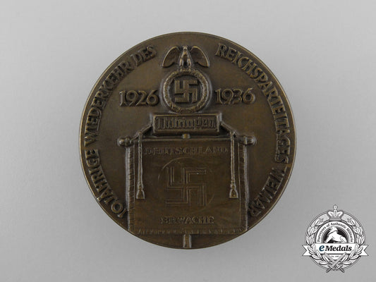 a_high_quality1936“10_year_anniversary_of_the_return_of_the_reichsparteitag_weimar”_badge_by_h._wernstein_d_8600