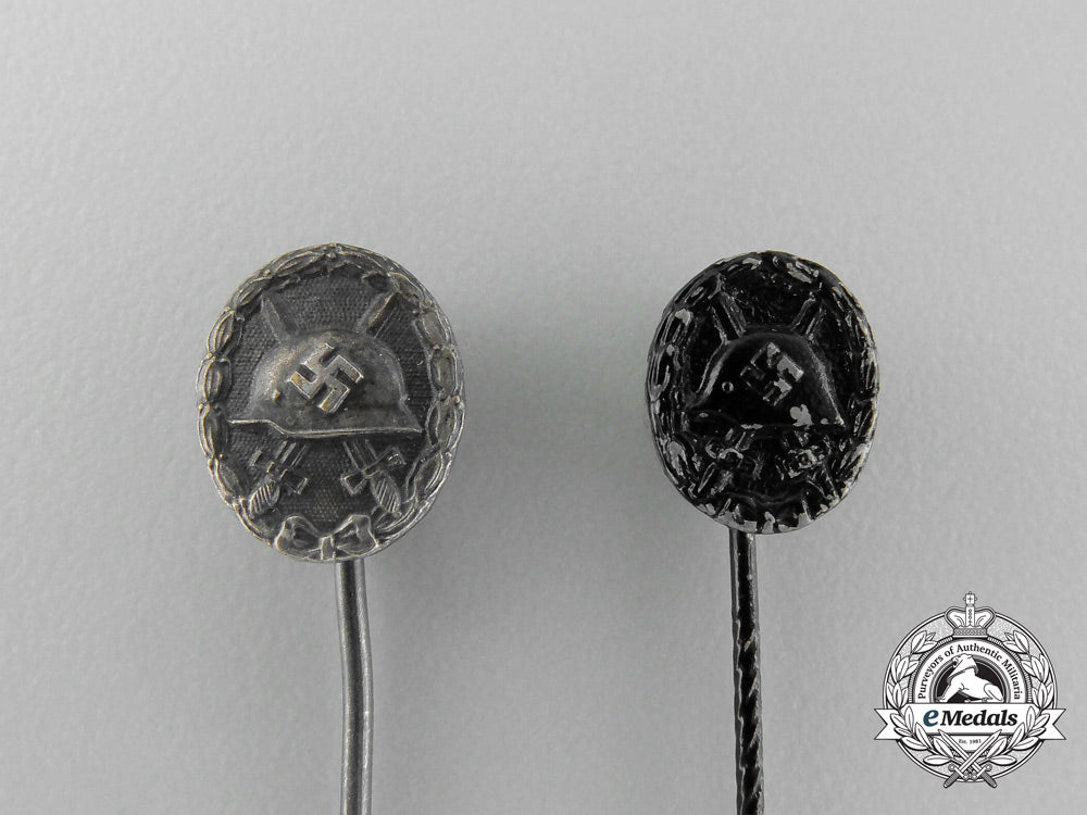 a_grouping_of_two_second_war_german_miniature_wound_badge_stick_pins_d_8763_1