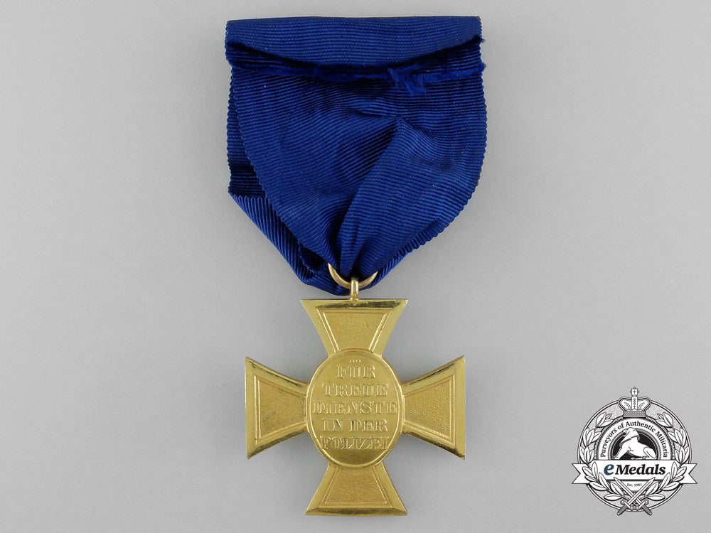 a_police25_year_long_service_cross;_first_class_in_its_original_case_of_issue_d_8890_1