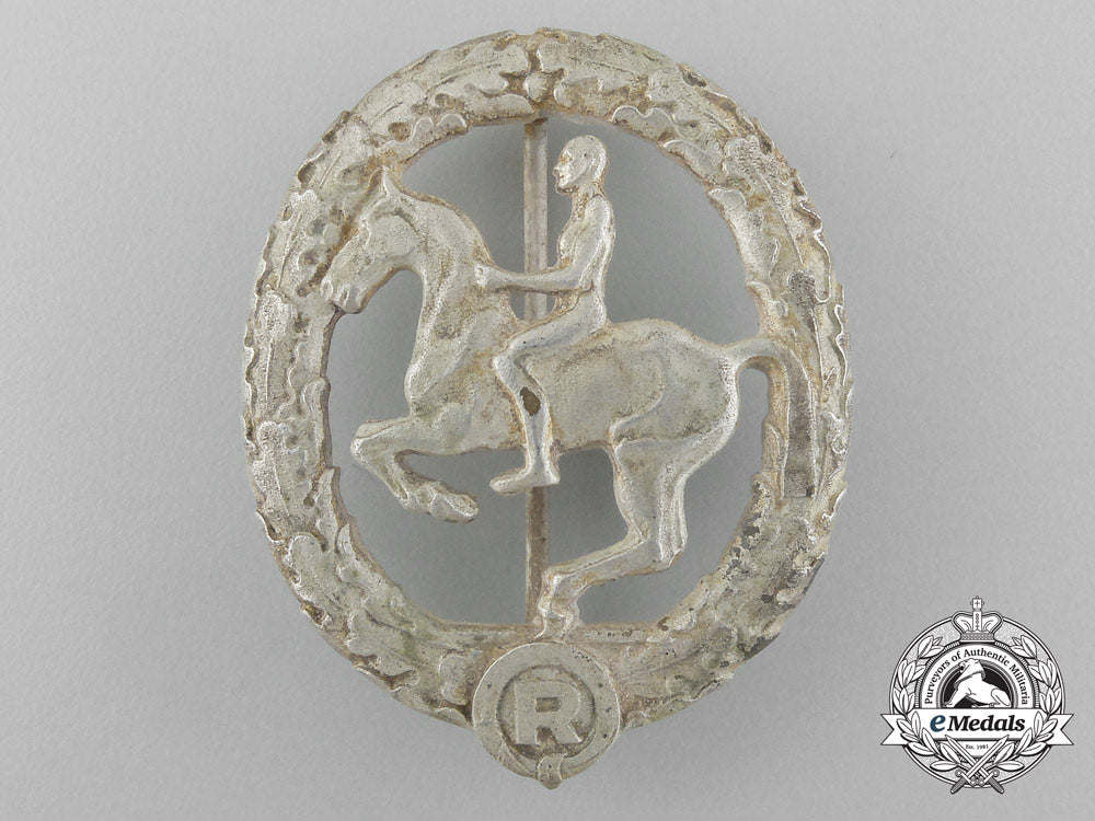 germany,_third_reich._a_silver_grade_horseman's_badge_by_steinhauer&_lück_in_its_original_case_of_issue_d_8919_1