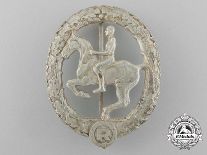 germany,_third_reich._a_silver_grade_horseman's_badge_by_steinhauer&_lück_in_its_original_case_of_issue_d_8919_1