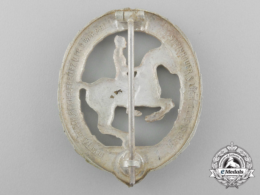 germany,_third_reich._a_silver_grade_horseman's_badge_by_steinhauer&_lück_in_its_original_case_of_issue_d_8920_1