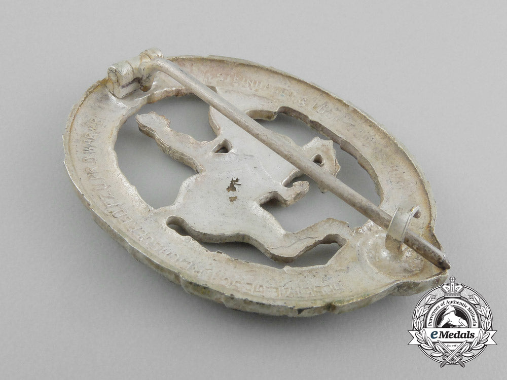 germany,_third_reich._a_silver_grade_horseman's_badge_by_steinhauer&_lück_in_its_original_case_of_issue_d_8922_1