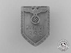 A Landau/Pfalz Construction Management Guard’s Badge