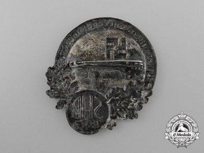 germany,_nsdap._a1938_linz“_we_thank_our_führer-_our_homeland_is_free”_badge_d_8978_1