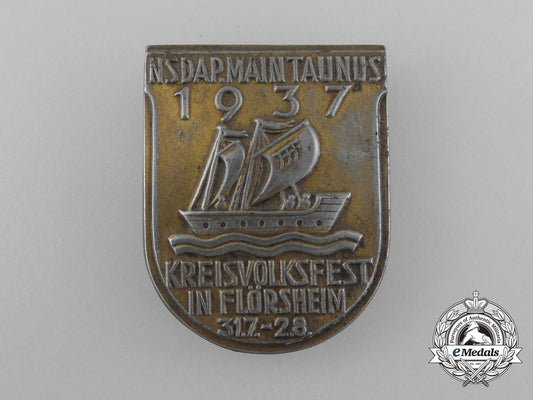 a1937_nsdap_flörsheim_district_volkswest_badge_d_8983