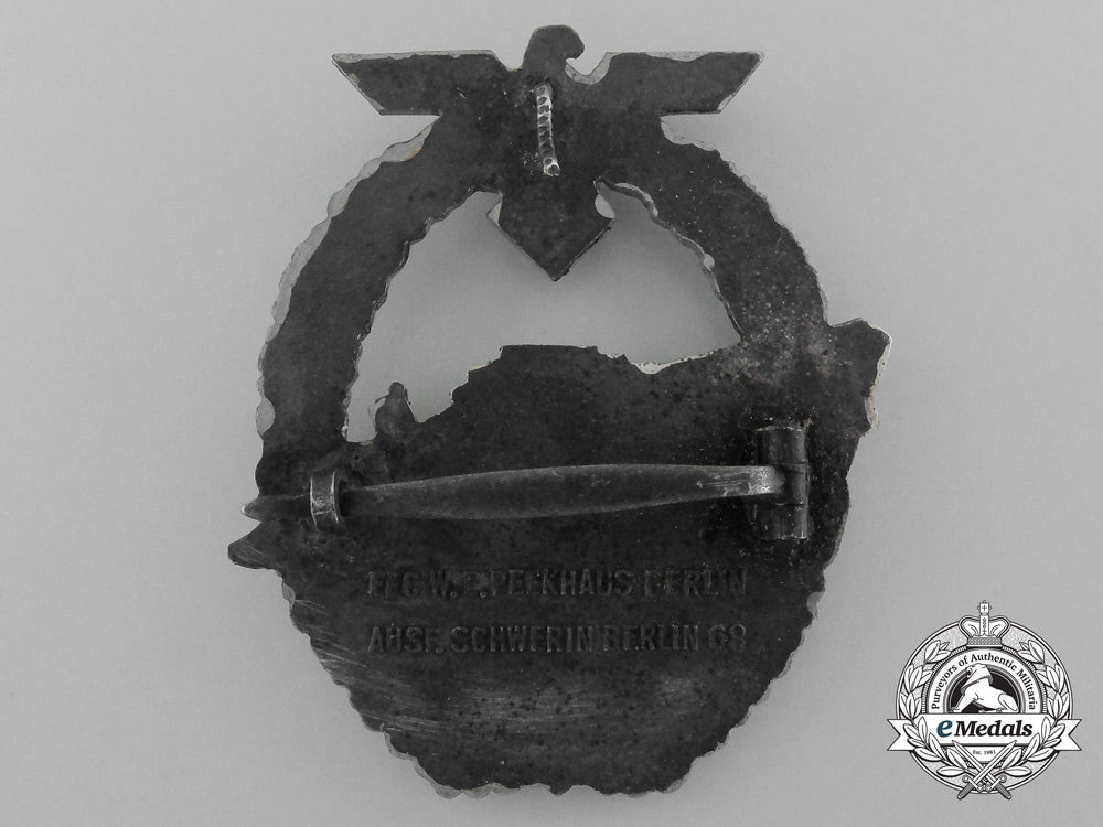 a_second_pattern_kriegsmarine_e-_boat_badge_by_schwerin_in_its_original_carton_d_9190
