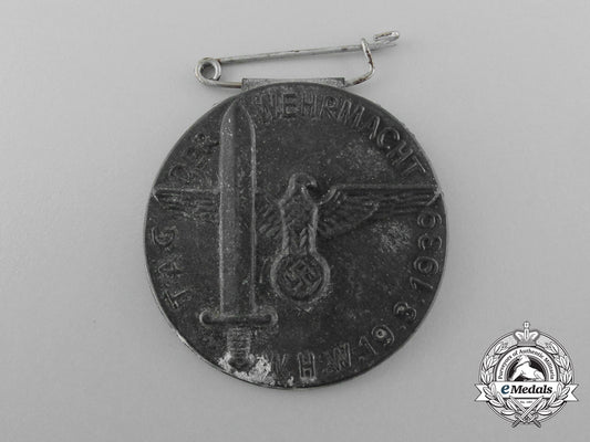 a1939“_day_of_the_wehrmacht”_winter_aid_of_the_german_people_badge_d_9422