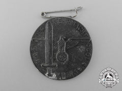A 1939 “Day Of The Wehrmacht” Winter Aid Of The German People Badge