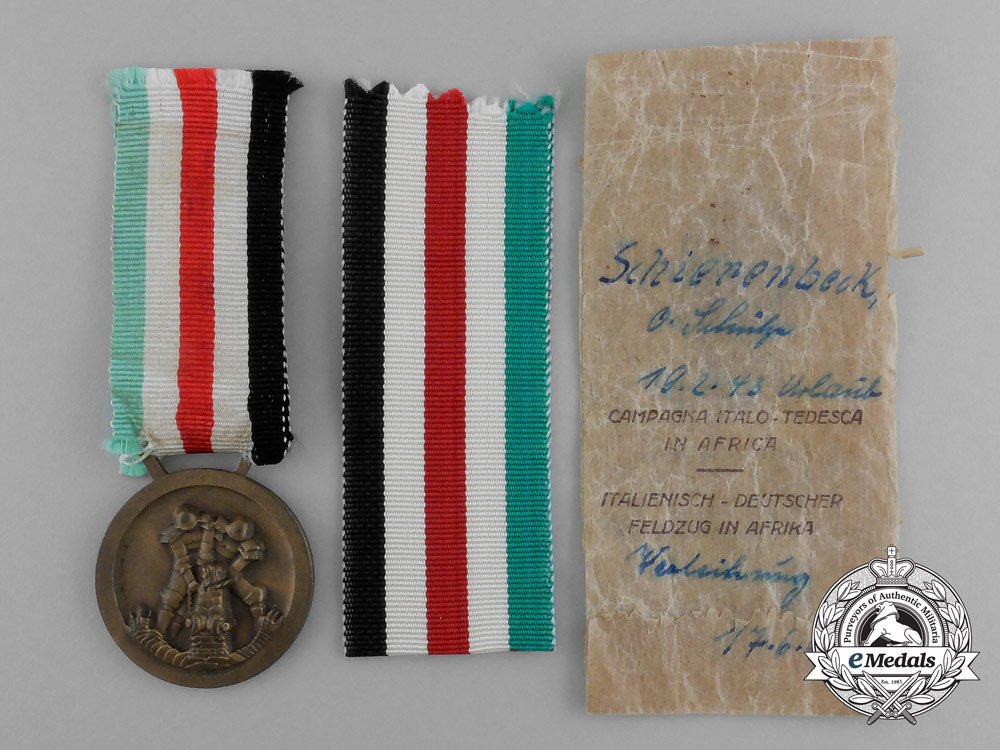 a_german-_italian_africa_campaign_medal_with_its_original_packet_of_issue_by_lorioli_fratelli_d_9448_1