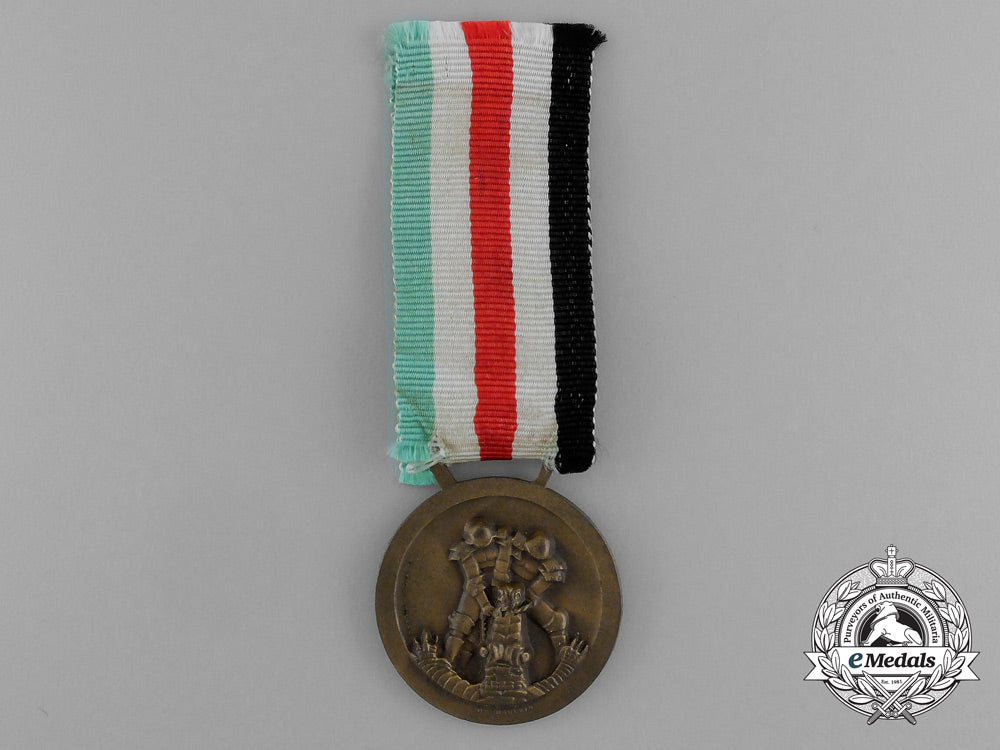 a_german-_italian_africa_campaign_medal_with_its_original_packet_of_issue_by_lorioli_fratelli_d_9449_1