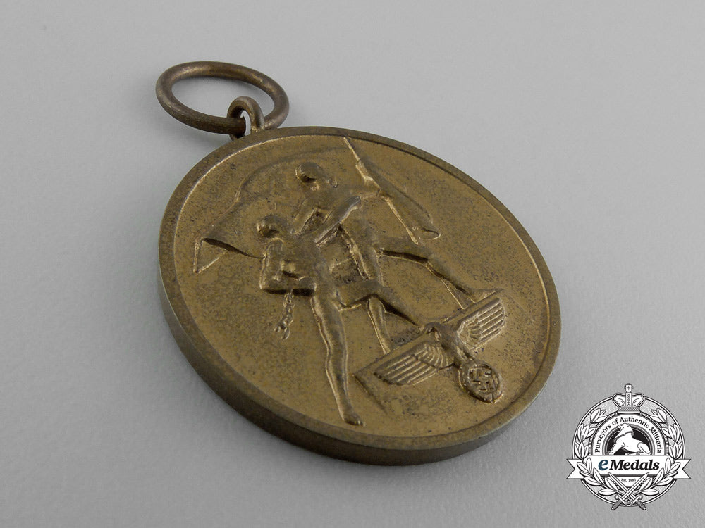 a_commemorative_return_of_memel_medal_in_its_original_case_of_issue_d_9508_1