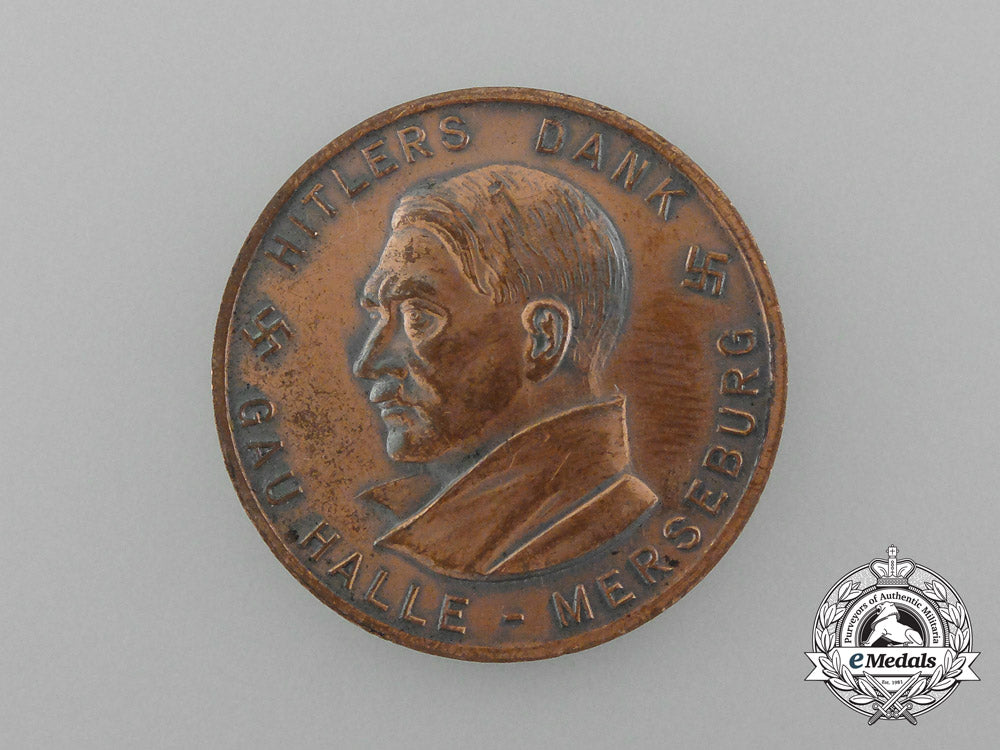 a1933/34_winter_relief_of_the_german_people“_the_führer’s_thanks”_donation_coin_d_9762