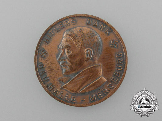 a1933/34_winter_relief_of_the_german_people“_the_führer’s_thanks”_donation_coin_d_9762